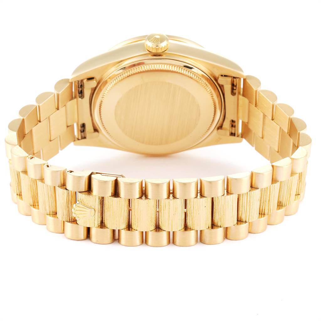 The image shows the back and bracelet of a Rolex President 18108 Men
s Yellow Gold Brown Dial 18108 Men
s Yellow Gold Brown Dial model watch, highlighting the clasp and case back.