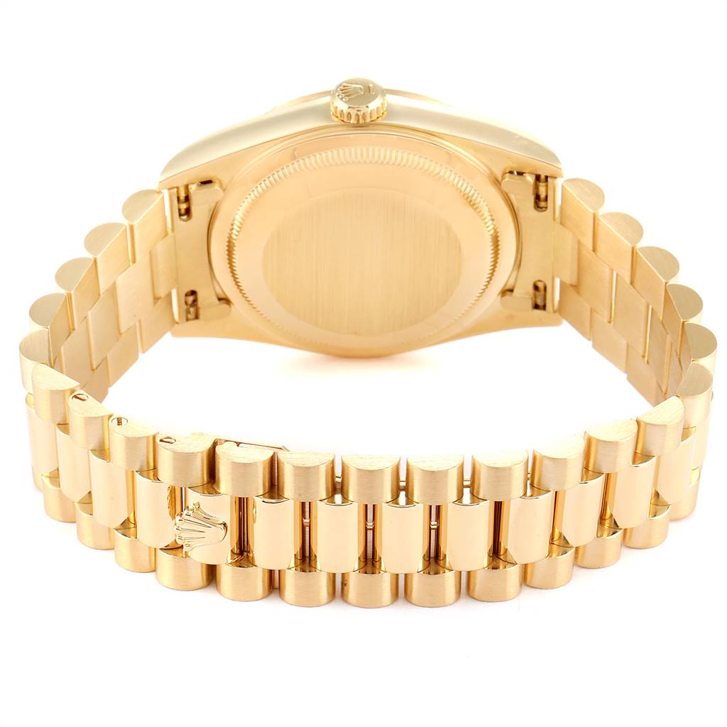 This image shows the back case and bracelet of a Rolex President 18238 Men
s Yellow Gold Champagne Dial 18238 Men
s Yellow Gold Champagne Dial model watch at a rear angle.