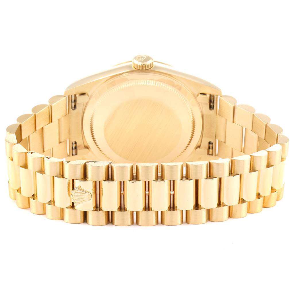 The image shows the back view of a Rolex President 18238 Men
s Yellow Gold Champagne Dial 18238 Men
s Yellow Gold Champagne Dial watch, highlighting the bracelet and case back.