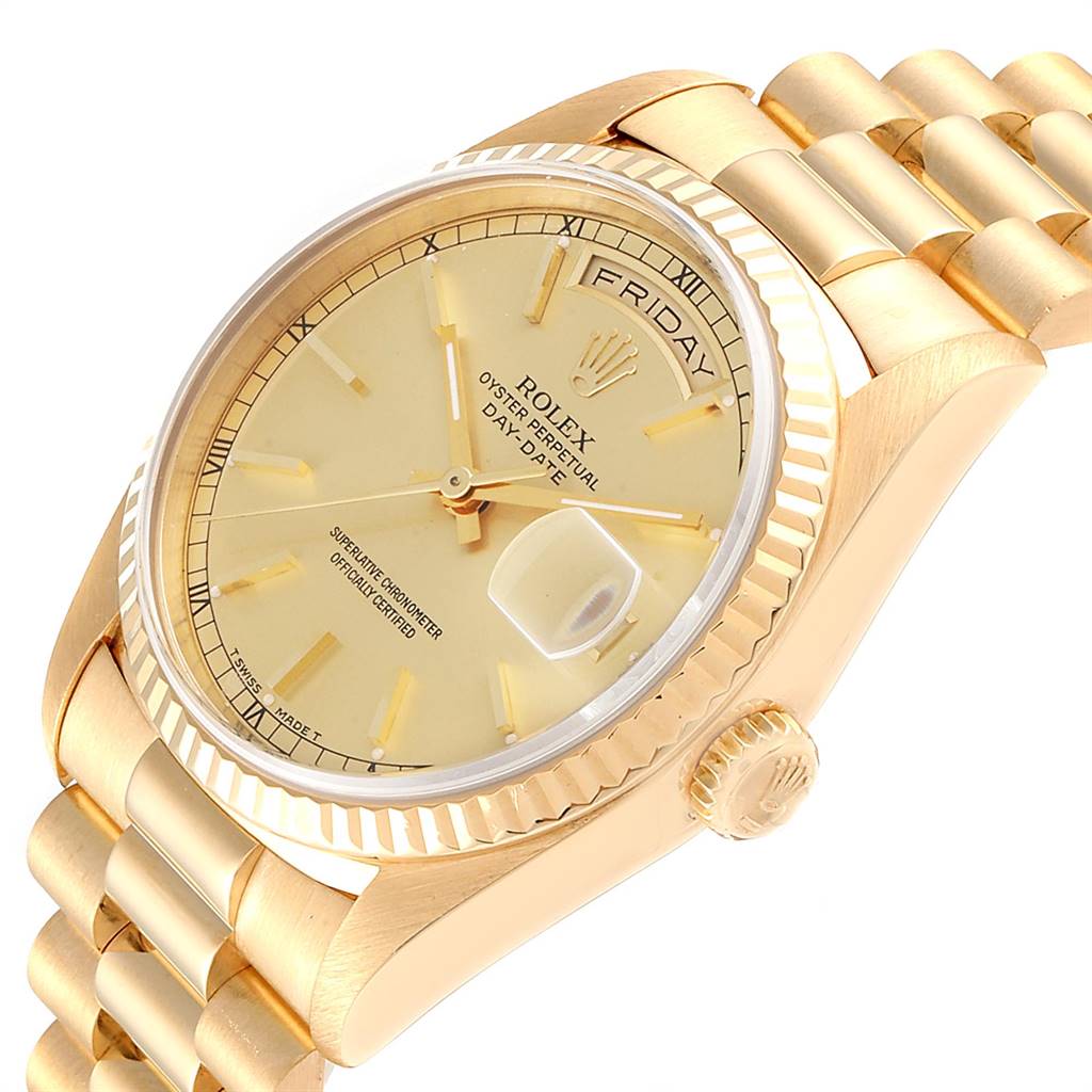 The image shows a Rolex President 18238 Men
s Yellow Gold Champagne Dial 18238 Men
s Yellow Gold Champagne Dial model watch at an angled close-up, highlighting the dial, bezel, crown, and part of the bracelet.