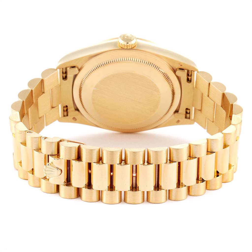This image shows the back view of a Rolex President 18238 Men
s Yellow Gold Champagne Dial 18238 Men
s Yellow Gold Champagne Dial model watch, highlighting the case back and bracelet.