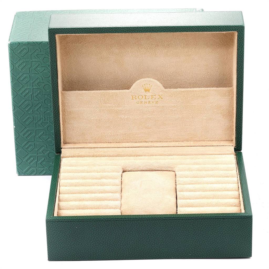 This image shows an open Rolex President 18238 Men
s Yellow Gold Champagne Dial 18238 Men
s Yellow Gold Champagne Dial model watch box with a green exterior and beige interior, viewed from the front.