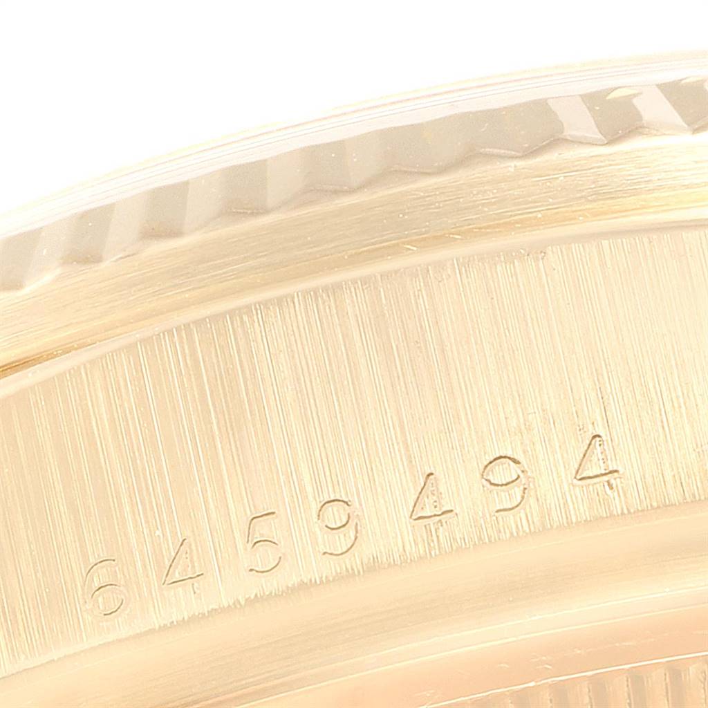 This image shows a close-up of the caseback edge with serial numbers on a Rolex President 18038 Men's Yellow Gold Champagne Dial 18038 Men's Yellow Gold Champagne Dial model watch.