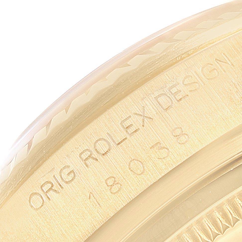This close-up shows the engraved case design and model number of the Rolex President 18038 Men's Yellow Gold Champagne Dial 18038 Men's Yellow Gold Champagne Dial watch.