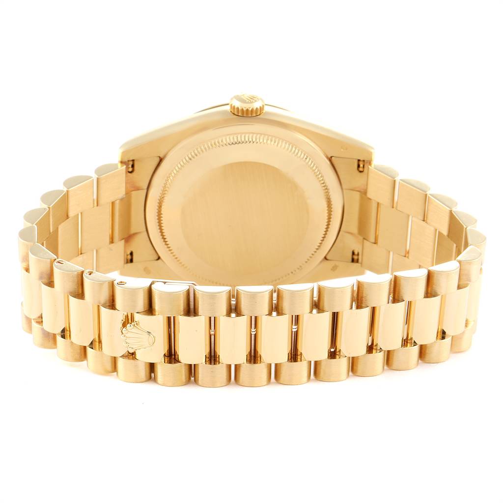 The image shows the back case and bracelet of a Rolex President 118238 Men
s Yellow Gold Champagne Dial 118238 Men
s Yellow Gold Champagne Dial model watch in a gold finish.