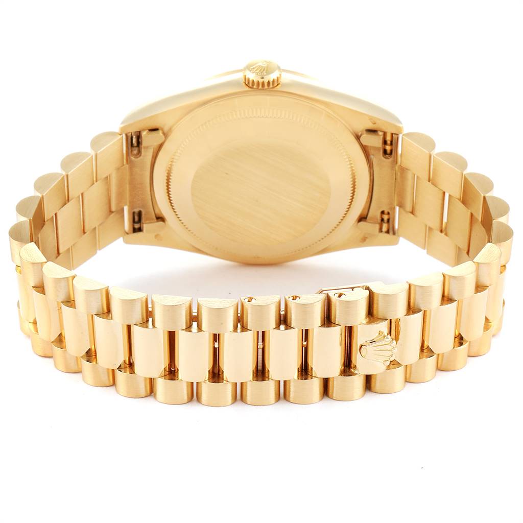 This image shows the back and bracelet of a Rolex President 18238 Men
s Yellow Gold Champagne Dial 18238 Men
s Yellow Gold Champagne Dial model watch from a rear angle.