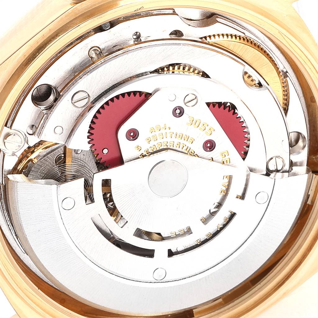 This image shows the intricate internal mechanism of a Rolex President 18038 Men's Yellow Gold Champagne Dial 18038 Men's Yellow Gold Champagne Dial model watch, focusing on its movement components.