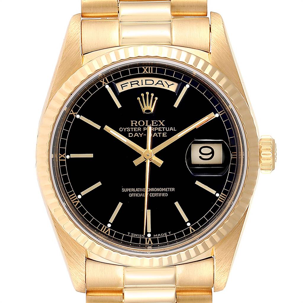 The image shows a front view of a Rolex President 18238 Men
s Yellow Gold Black Dial 18238 Men
s Yellow Gold Black Dial model watch, highlighting its gold casing, black dial, day-date display, and gold bracelet.