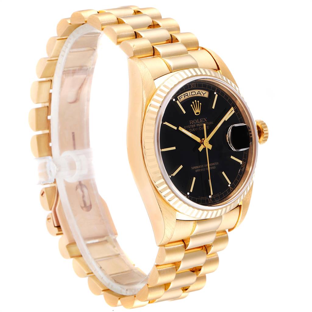 The image shows a side angle of the Rolex President 18238 Men
s Yellow Gold Black Dial 18238 Men
s Yellow Gold Black Dial model watch, highlighting the gold bracelet, black dial, and fluted bezel.