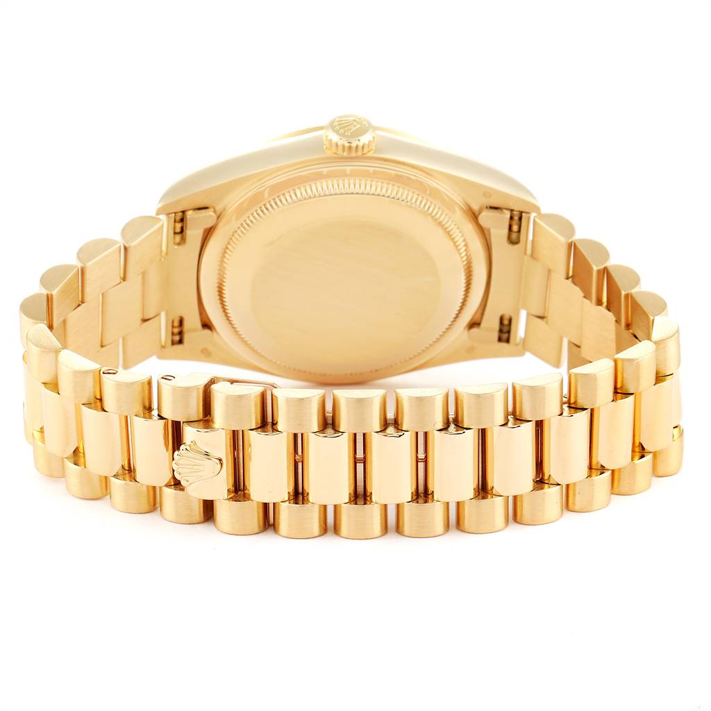 The image shows the back case and bracelet of a Rolex President 18238 Men
s Yellow Gold Black Dial 18238 Men
s Yellow Gold Black Dial model watch from a rear angle.