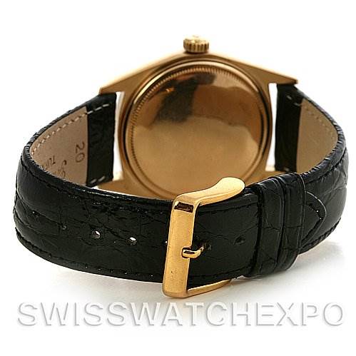 The image shows the back side and the leather strap with a buckle of a Rolex President 1803 Men's Yellow Gold Silver Dial 1803 Men's Yellow Gold Silver Dial model watch.