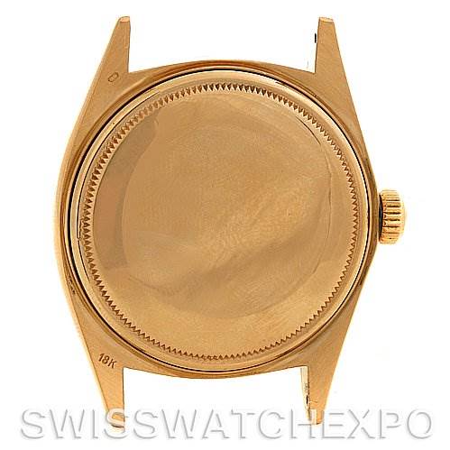 This image shows the back case and crown of a Rolex President 1803 Men's Yellow Gold Silver Dial 1803 Men's Yellow Gold Silver Dial model watch.