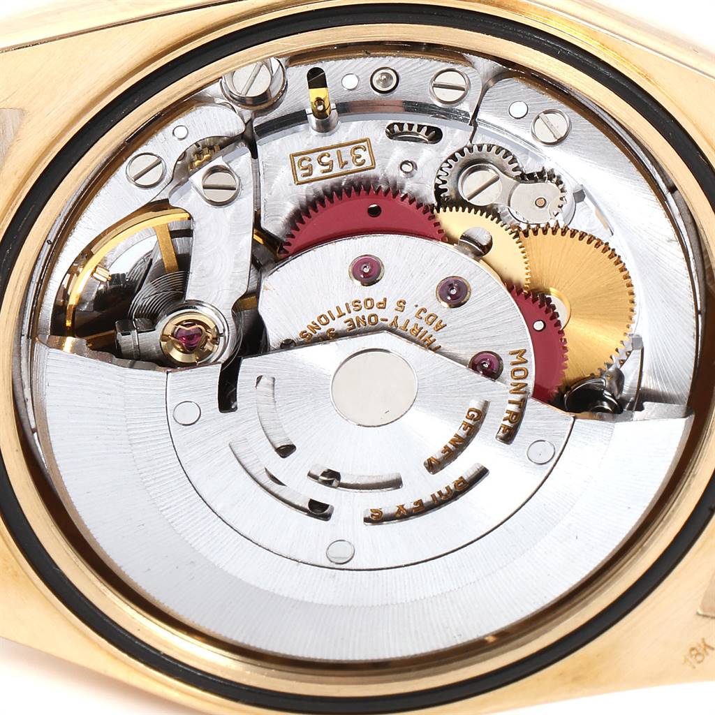 This image shows a close-up view of the movement mechanism inside a Rolex President 18238 Men's Yellow Gold Champagne Dial 18238 Men's Yellow Gold Champagne Dial model watch.