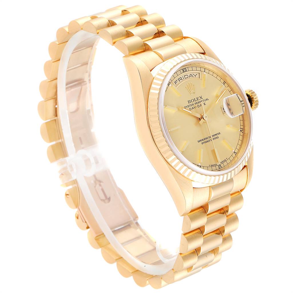 The Rolex President 18238 Men's Yellow Gold Champagne Dial 18238 Men's Yellow Gold Champagne Dial model watch is shown at a slight angle, highlighting its gold bracelet, fluted bezel, and dial with the date.