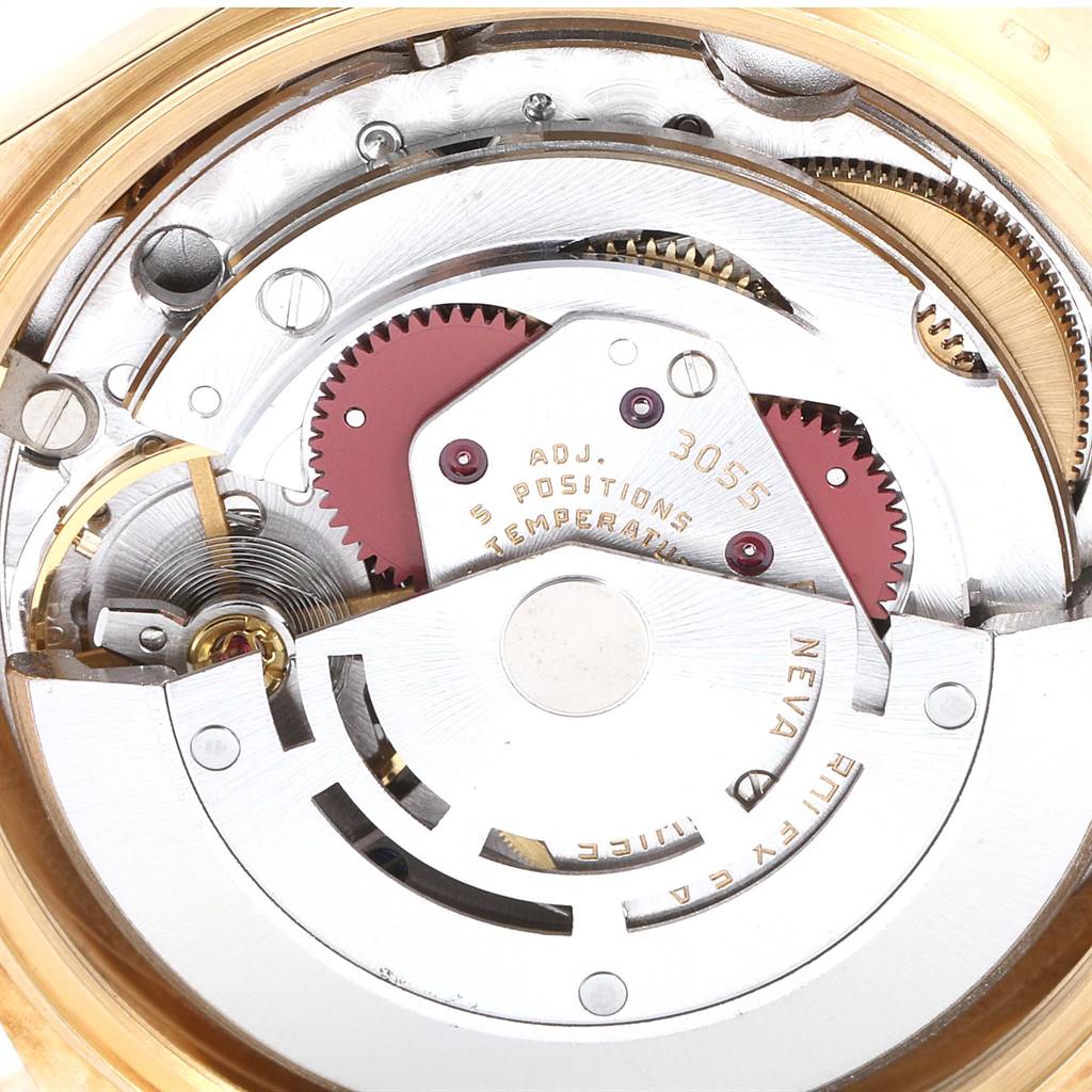 This image shows the internal mechanism of the Rolex President 18038 Men
s Yellow Gold Champagne Dial 18038 Men
s Yellow Gold Champagne Dial model watch from an angled close-up view, displaying its intricate components.