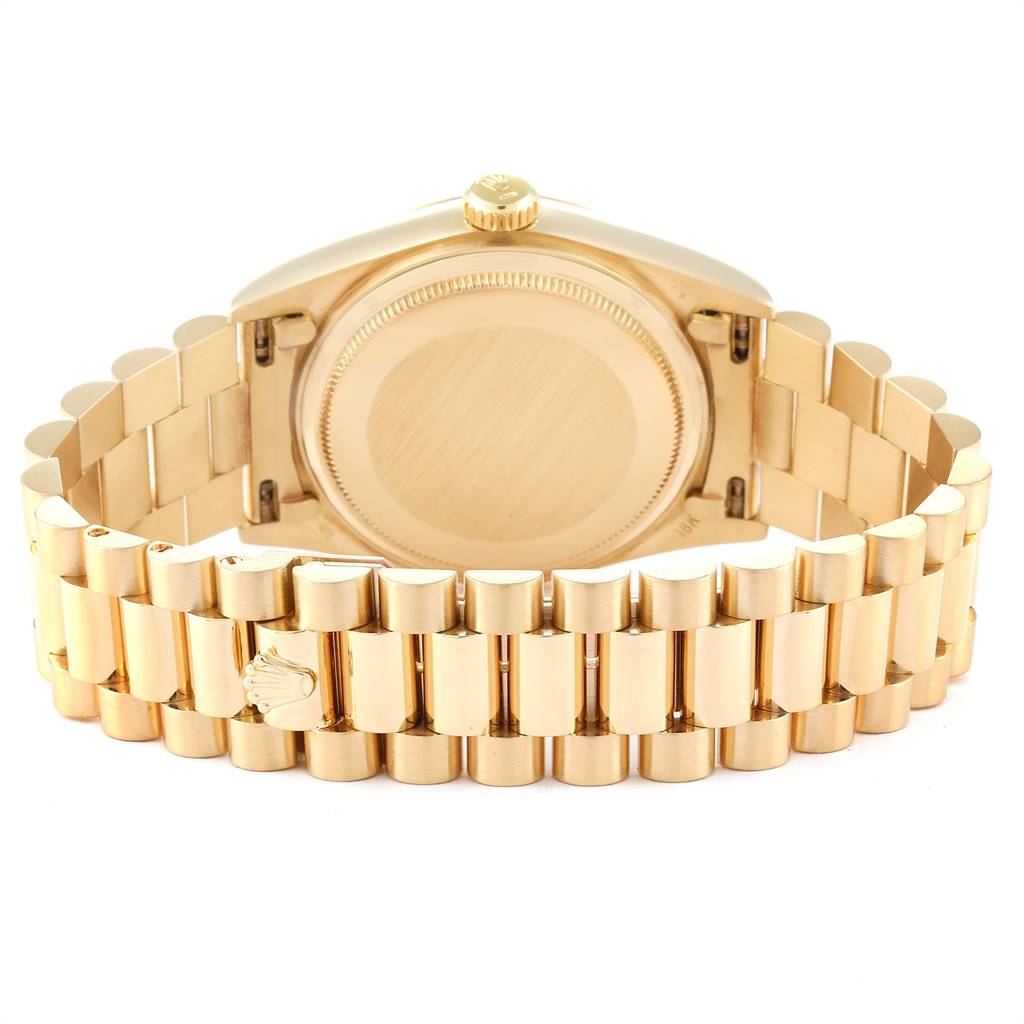 The image shows the back view, including the case back and bracelet, of a Rolex President 18038 Men
s Yellow Gold Champagne Dial 18038 Men
s Yellow Gold Champagne Dial model watch.