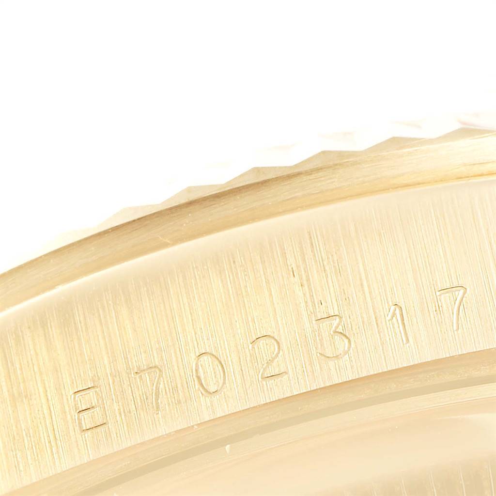 This image displays a close-up of the serial number engraved on the case back of a Rolex President 16238 Men
s Yellow Gold Champagne Dial 16238 Men
s Yellow Gold Champagne Dial watch.