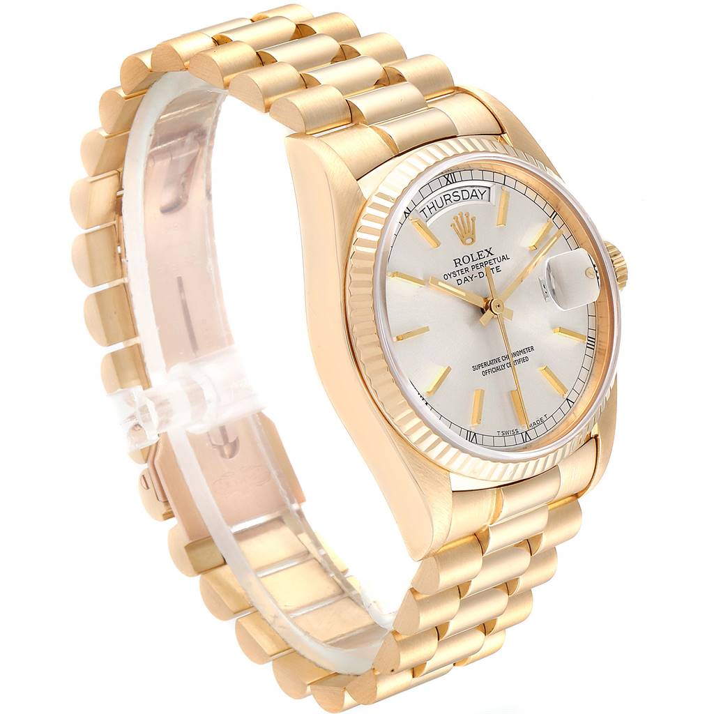 The image shows a side view of the Rolex President 18038 Men
s Yellow Gold Silver Dial 18038 Men
s Yellow Gold Silver Dial model, highlighting the gold bracelet, watch face, bezel, hour markers, and date magnifier.