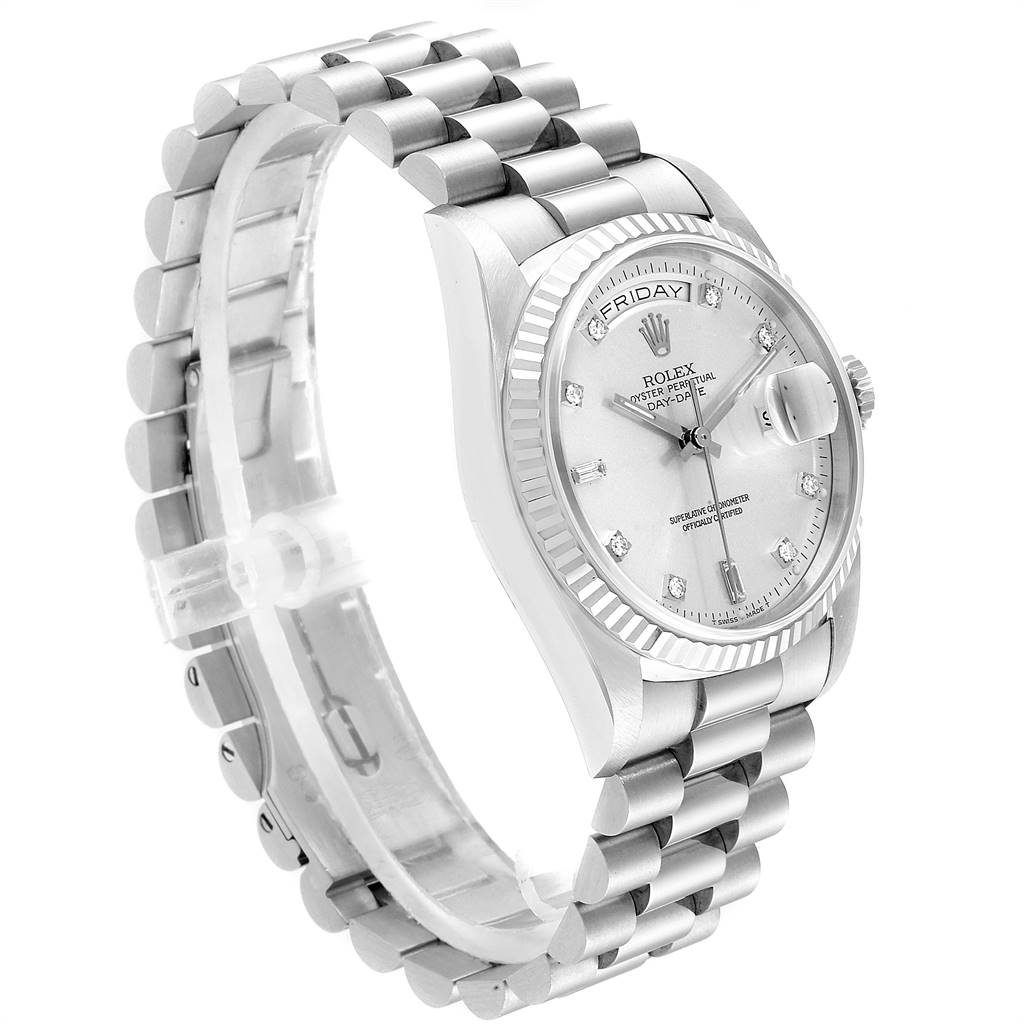This Rolex President 18239 Men's White Gold Silver Dial 18239 Men's White Gold Silver Dial model watch is shown at a three-quarter angle, highlighting its silver bracelet, fluted bezel, and diamond hour markers.