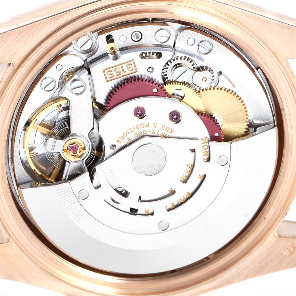 This close-up image shows the intricate internal mechanism of the Rolex President 118235 Men's Rose Gold Champagne Dial 118235 Men's Rose Gold Champagne Dial model watch.