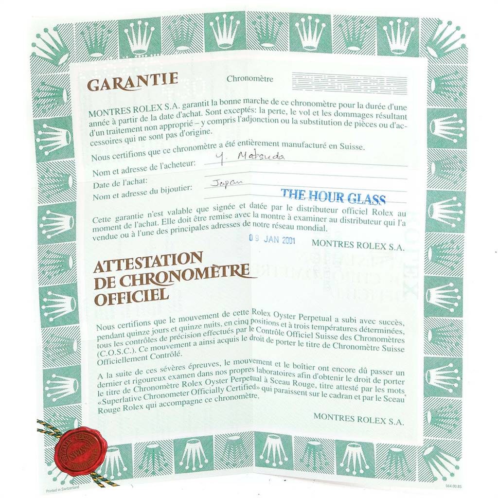 This image shows a warranty and official chronometer certificate for the Rolex President 118235 Men's Rose Gold Champagne Dial 118235 Men's Rose Gold Champagne Dial model.