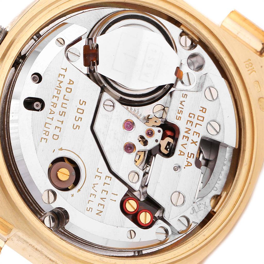 The image shows the inner mechanical workings of a Rolex President 19018 Men
s Yellow Gold Black Dial 19018 Men
s Yellow Gold Black Dial model watch from a top-down angle.