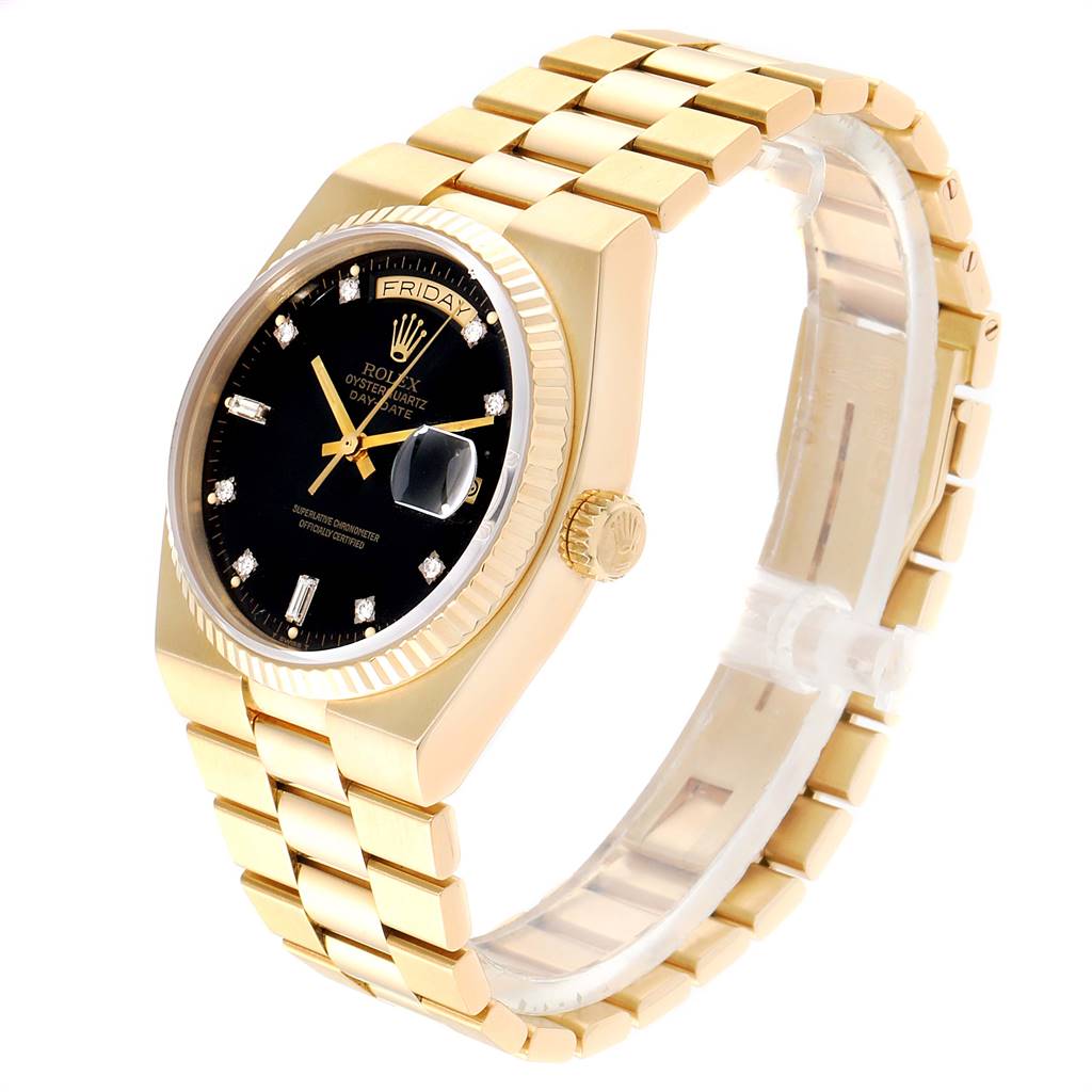 This image shows a Rolex President 19018 Men
s Yellow Gold Black Dial 19018 Men
s Yellow Gold Black Dial model watch angled to display its gold bracelet, black dial, and fluted bezel.