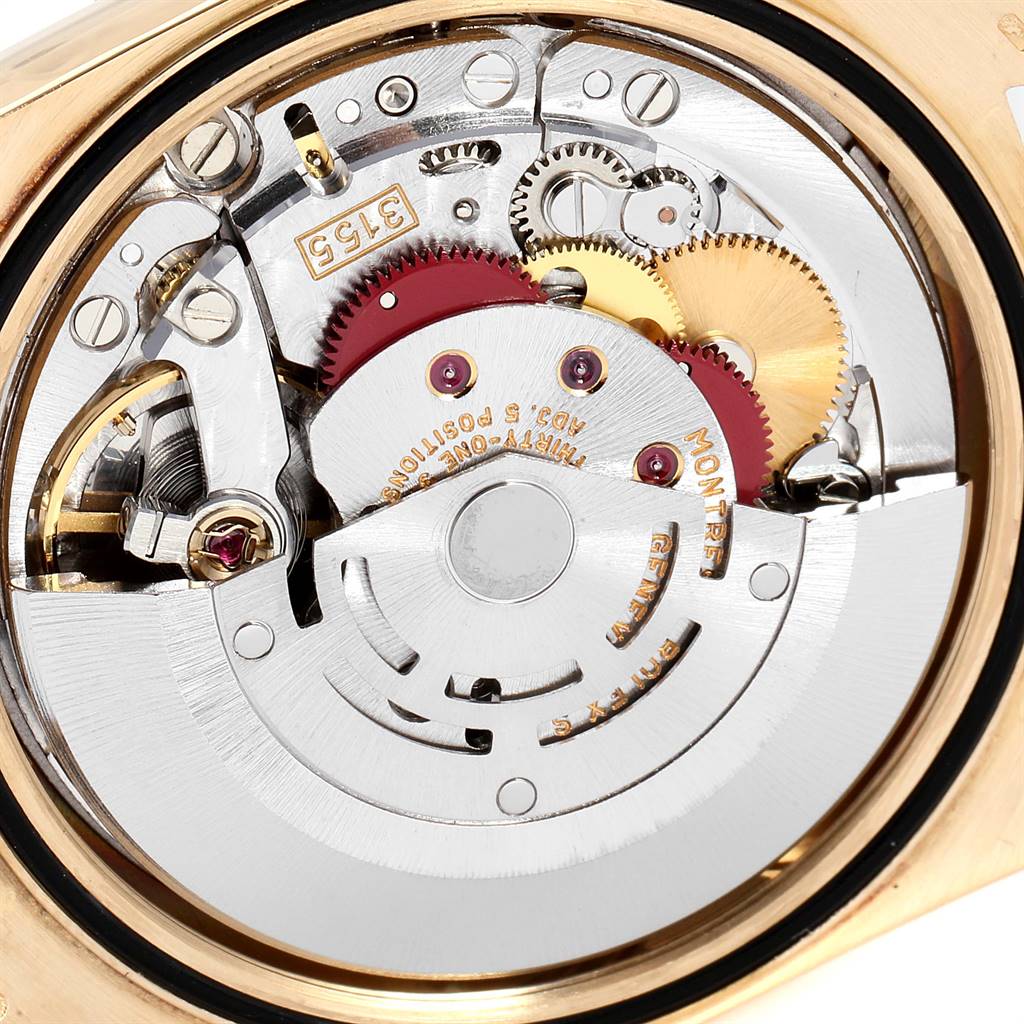 This image shows the inner mechanical parts and movement of the Rolex President 18238 Men
s Yellow Gold Black Dial 18238 Men
s Yellow Gold Black Dial model watch.