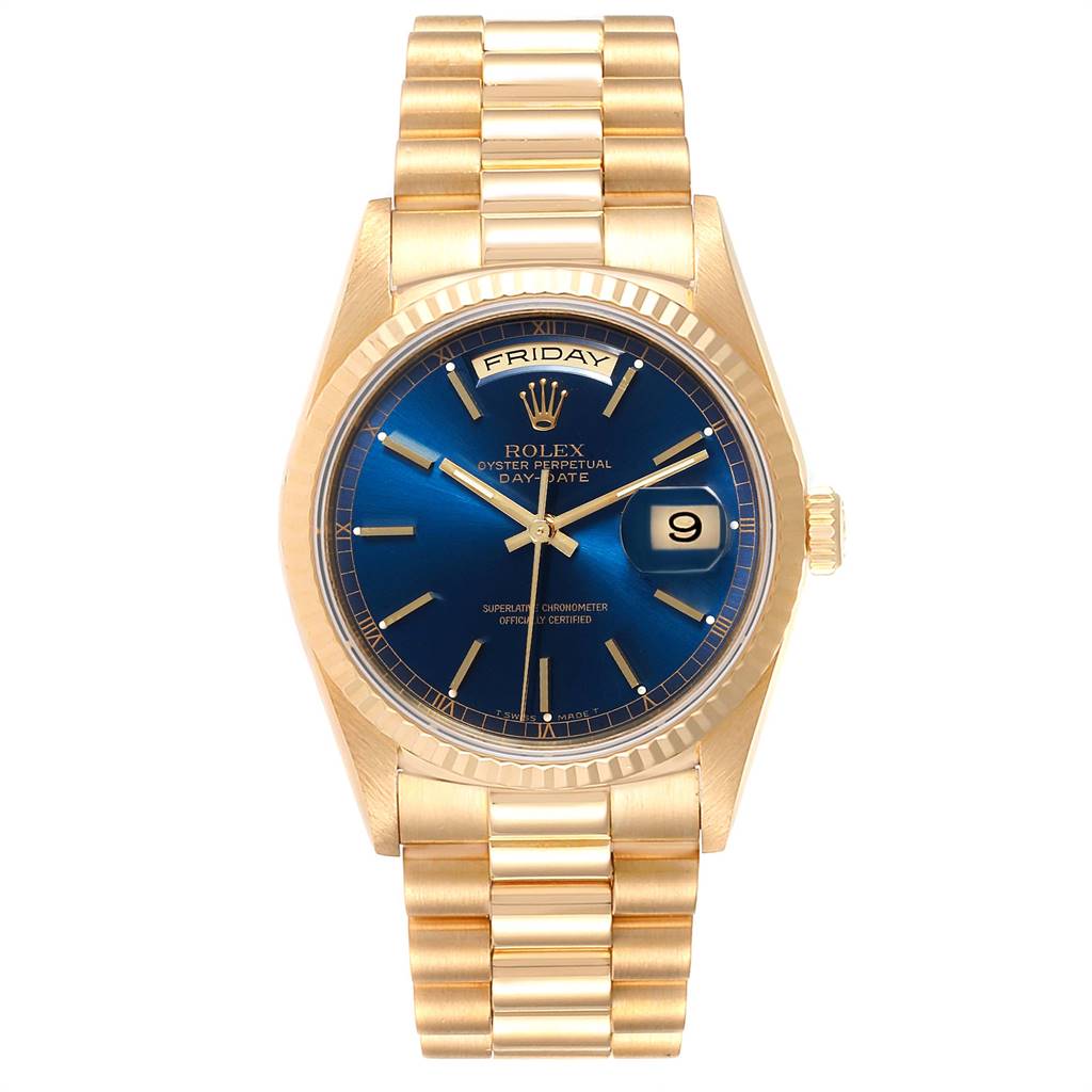 The image shows a Rolex President 18238 Men
s Yellow Gold Blue Dial 18238 Men
s Yellow Gold Blue Dial model watch with a blue dial, gold case, day-date indicators, and a gold bracelet, viewed from the front.