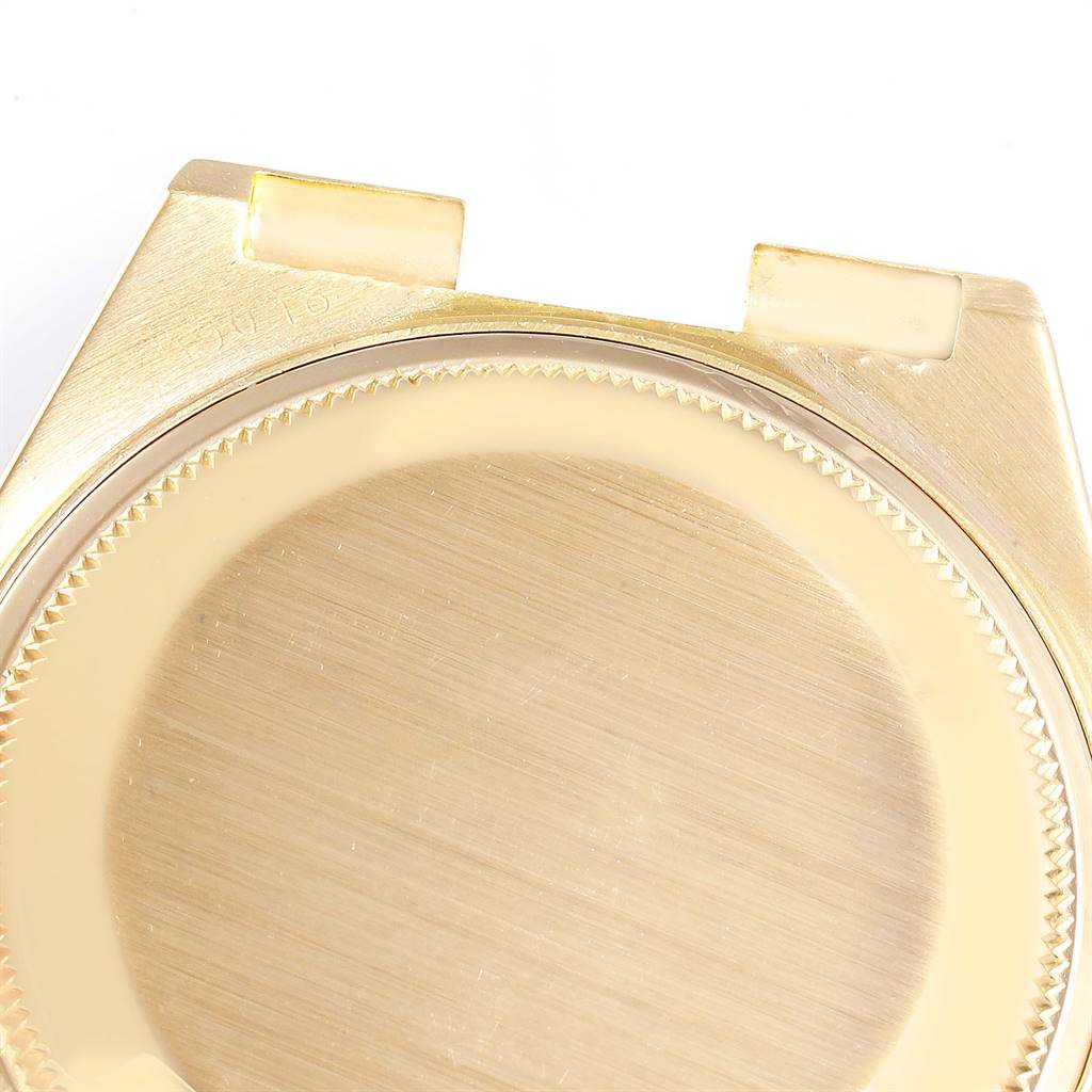 The image shows the back casing and lugs of a Rolex President 19018 Men
s Yellow Gold Black Dial 19018 Men
s Yellow Gold Black Dial model watch from a top-down angle.