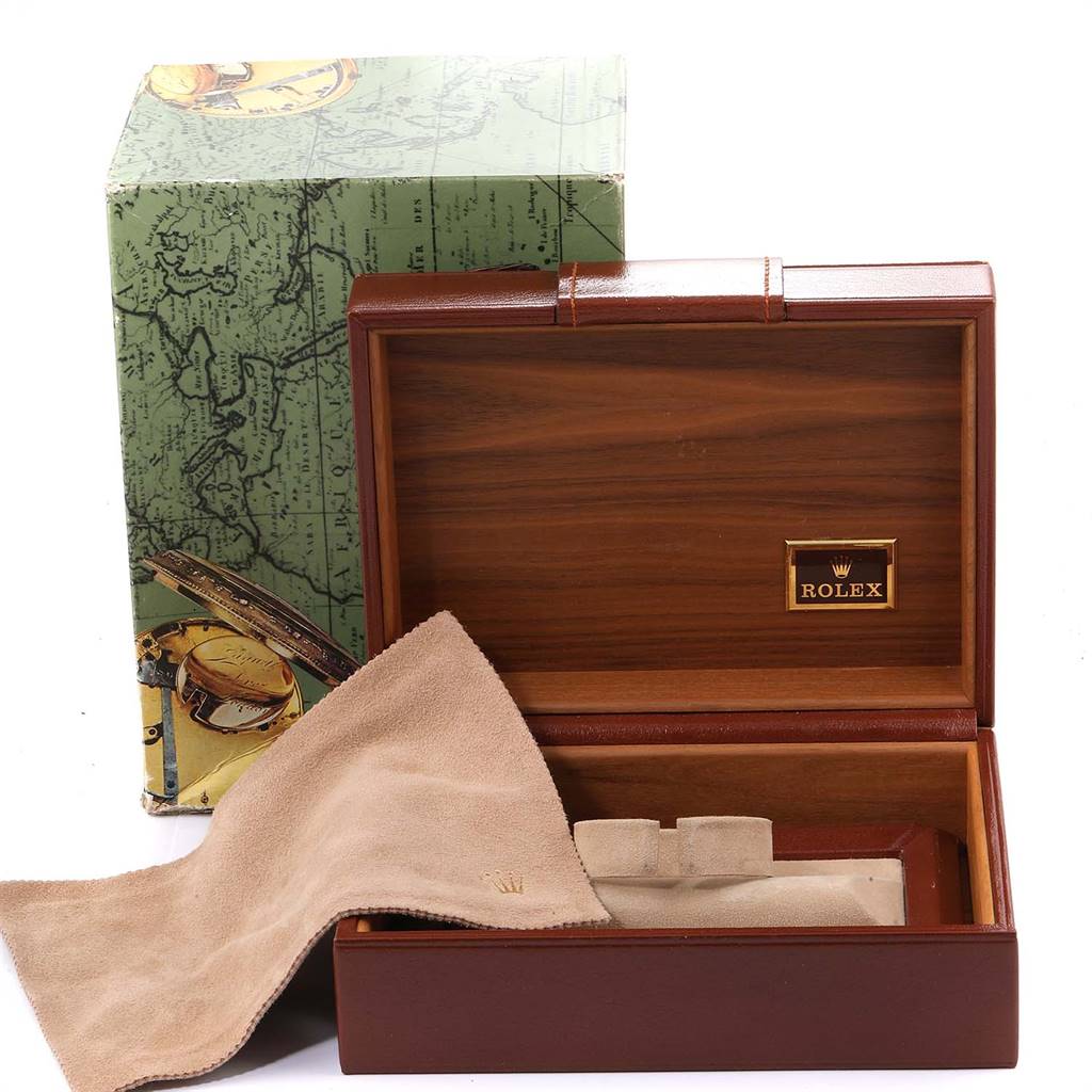 The image shows the packaging and accessories for the Rolex President 19018 Men
s Yellow Gold Black Dial 19018 Men
s Yellow Gold Black Dial model, including a wooden box, outer box, and cleaning cloth.