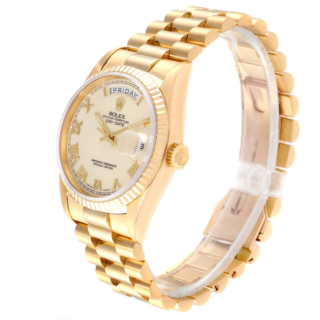 The Rolex President 18238 Men
s Yellow Gold Beige Dial 18238 Men
s Yellow Gold Beige Dial model is shown at an angle highlighting its gold bracelet, bezel, and face displaying the day and date.