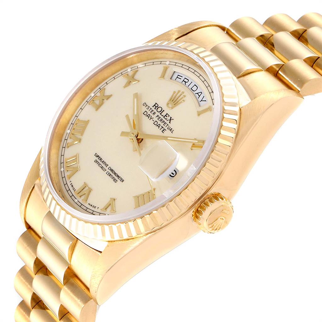 This image shows a close-up angled view of the Rolex President 18238 Men
s Yellow Gold Beige Dial 18238 Men
s Yellow Gold Beige Dial model watch, highlighting the case, dial, crown, and part of the bracelet.