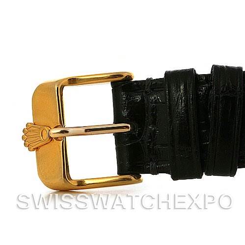This image shows a side view of a black leather strap and gold buckle with the Rolex crown, likely for a Rolex President 18038 Men's Yellow Gold White Dial 18038 Men's Yellow Gold White Dial model watch.