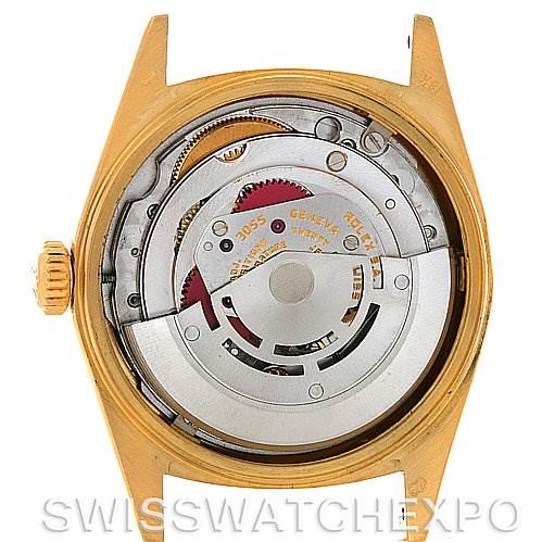 The image shows the back view of a Rolex President 18038 Men's Yellow Gold White Dial 18038 Men's Yellow Gold White Dial model, highlighting its intricate internal mechanism.