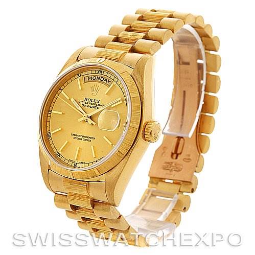 The image shows a side angle of a Rolex President 18038 Men
s Yellow Gold Champagne Dial 18038 Men
s Yellow Gold Champagne Dial model watch, highlighting the gold bracelet, dial, and day-date feature.