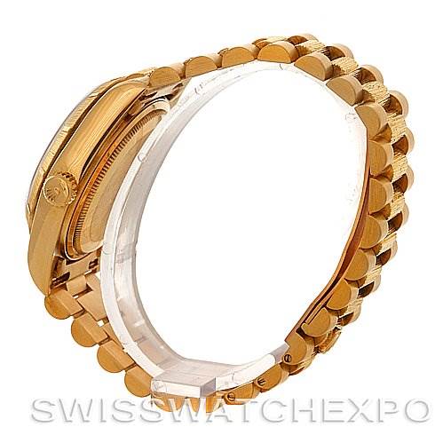 The image shows a side view of the Rolex President 18038 Men
s Yellow Gold Champagne Dial 18038 Men
s Yellow Gold Champagne Dial model watch, highlighting its gold case and the iconic President bracelet.