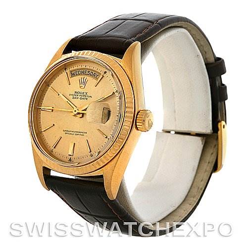 This image shows a Rolex President 1803 Men's Yellow Gold Champagne Dial 1803 Men's Yellow Gold Champagne Dial model watch at a slightly tilted angle, highlighting the face, bezel, crown, and leather strap.