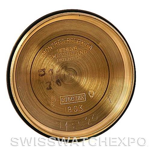 The image shows the interior of a Rolex President 1803 Men's Yellow Gold Champagne Dial 1803 Men's Yellow Gold Champagne Dial watch case back, displaying various inscriptions and markings.