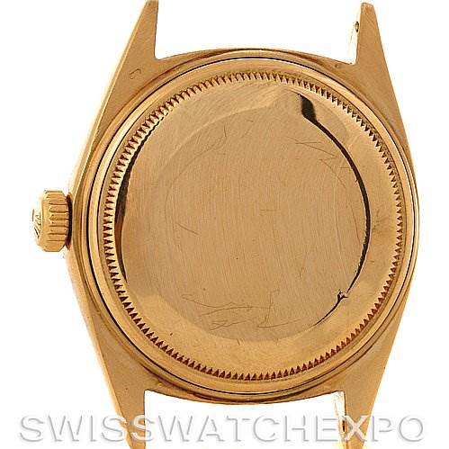 This image shows the case back and crown of a Rolex President 1803 Men's Yellow Gold Champagne Dial 1803 Men's Yellow Gold Champagne Dial model watch, viewed from the back.