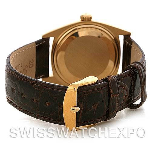 This is a rear view of the Rolex President 1803 Men's Yellow Gold Champagne Dial 1803 Men's Yellow Gold Champagne Dial model showing its gold case and brown leather strap with a gold buckle.