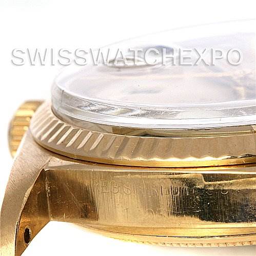 This close-up image shows the gold case side and bezel of a Rolex President 1803 Men's Yellow Gold Champagne Dial 1803 Men's Yellow Gold Champagne Dial model watch, with an emphasis on the engraved details.