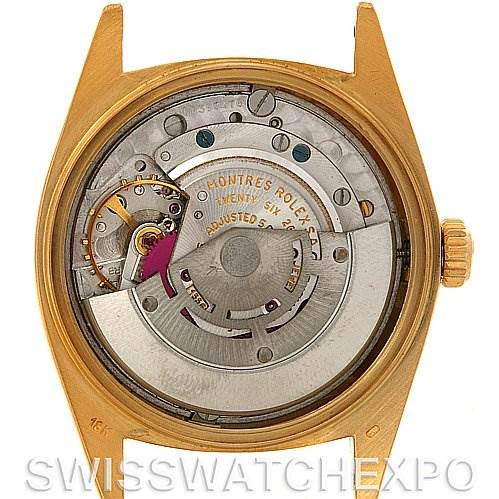 This image shows the inner mechanism of a Rolex President 1803 Men's Yellow Gold Champagne Dial 1803 Men's Yellow Gold Champagne Dial watch, viewed from the back with its case removed.