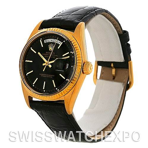 The image shows a side angle of the Rolex President 1803 Men
s Yellow Gold Black Dial 1803 Men
s Yellow Gold Black Dial model watch, highlighting its face, bezel, crown, and leather strap.