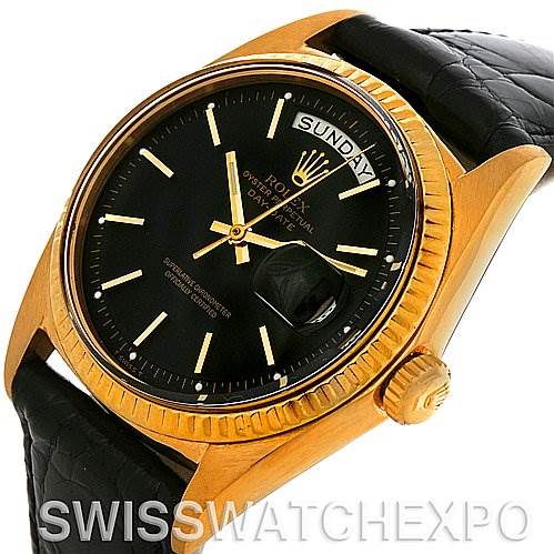This image features a Rolex President 1803 Men
s Yellow Gold Black Dial 1803 Men
s Yellow Gold Black Dial model watch at an oblique angle, highlighting its black dial, gold case, and black leather strap.
