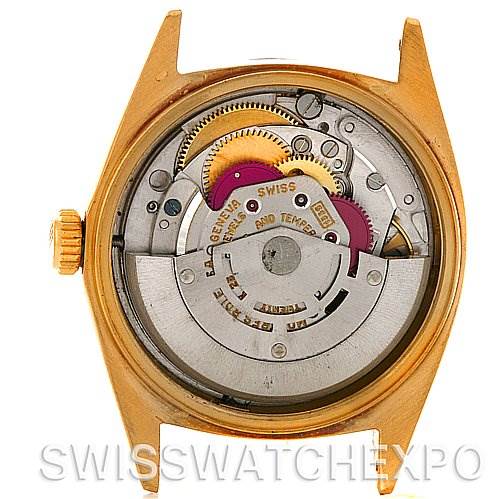 This image shows the internal mechanism of a Rolex President 1803 Men
s Yellow Gold Black Dial 1803 Men
s Yellow Gold Black Dial model watch from a rear, open case angle.
