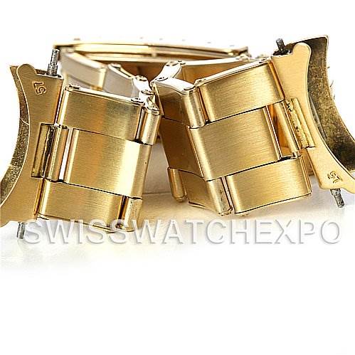 The image shows a close-up of gold links and clasps from a Rolex President 1500 Men's Yellow Gold Silver Dial 1500 Men's Yellow Gold Silver Dial model watch bracelet.