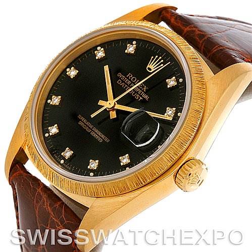 The image shows a close-up of the Rolex President 16078 Men
s Yellow Gold Black Dial 16078 Men
s Yellow Gold Black Dial model watch face, crown, and part of the brown leather strap from a 3 o
clock angle.