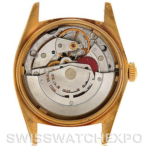 This image shows the internal mechanism and movement of the Rolex President 16078 Men
s Yellow Gold Black Dial 16078 Men
s Yellow Gold Black Dial model watch from a rear, open case angle.