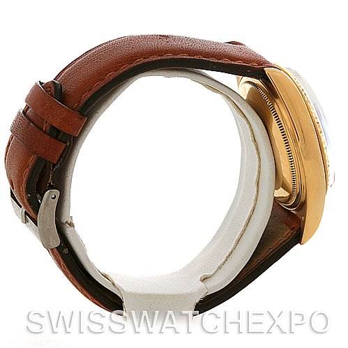 Side view of the Rolex President 1803 Men's Yellow Gold Champagne Dial 1803 Men's Yellow Gold Champagne Dial model, showing the leather strap and gold case.